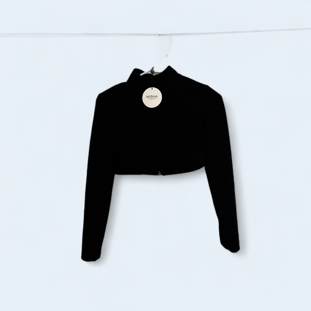Two piece set. Pencil skirt and cropped long sleeved top by Misha Collection.